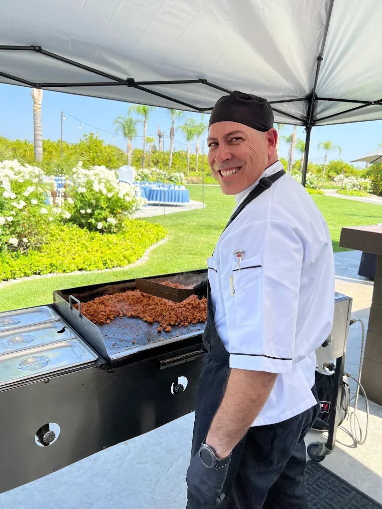 Chef preparing carne asada