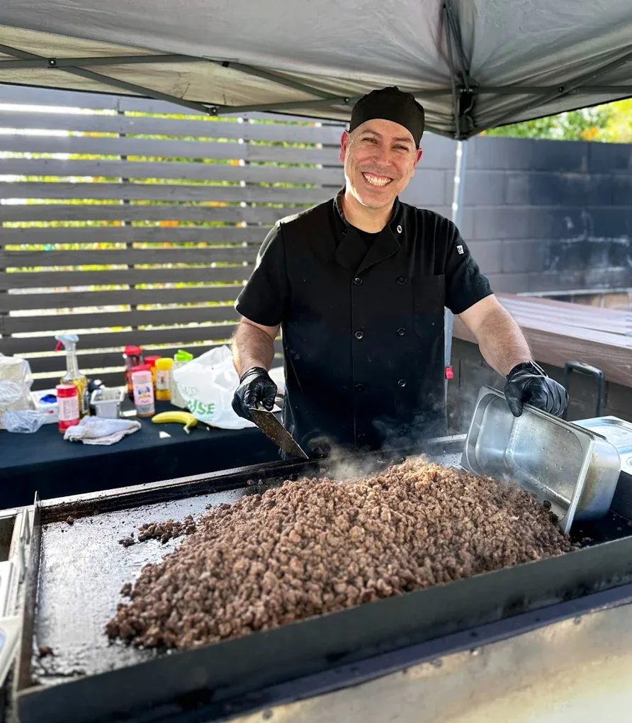Chef preparing carne asada
